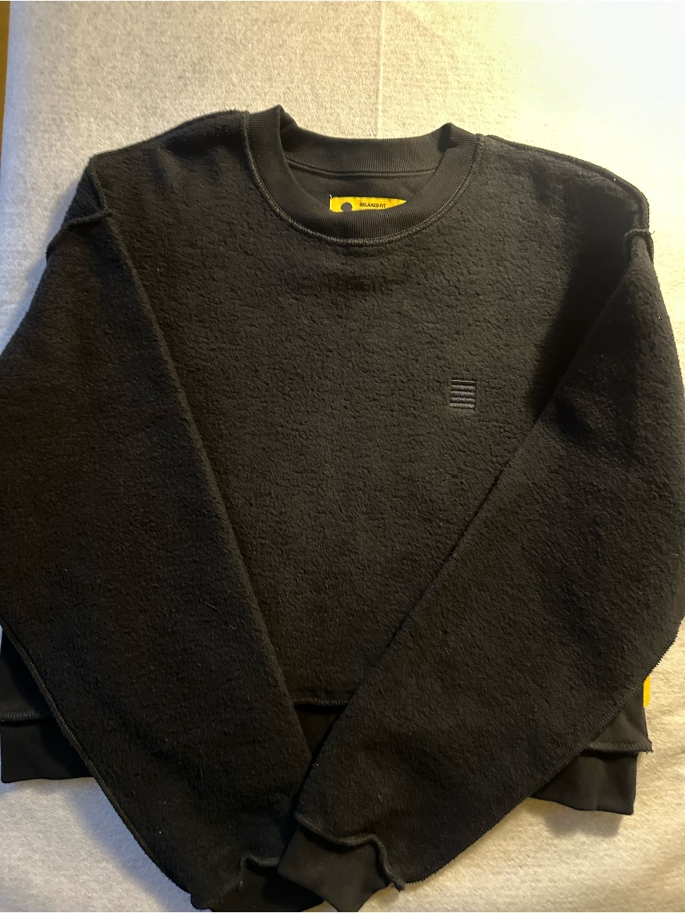 Yellow Label Co. black crewneck sweatshirt with intentional inside-out. Size S
